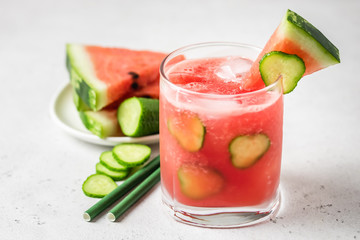 Refreshing summer watermelon cucumber gin and tonic. Space for text.