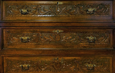 Dark wood carved decorated panels