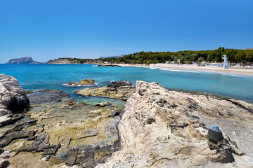 Fototapeta na wymiar Beach of Moraira, spanish coastal town. Spain