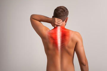Fototapeta premium Men's back, neck pain muscle and bone, spine injury