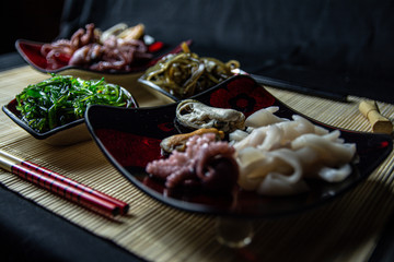 protein food, seafood, sushi on Japanese plates