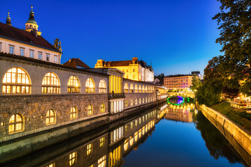 Fototapeta premium Ljubljana City Center overlooking Lublanka River at Dusk