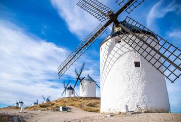 Fototapeta na wymiar Photo of some beautiful and historic windmills located in Consuegra, Toledo, Spain during a sunny day of summer in a natural place. 