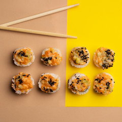 sushi and rolls on a bright colored background. High quality photo