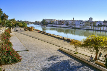 Fototapeta na wymiar City shore of Guadalquivir river in Seville