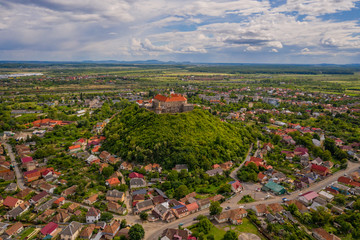 Beautiful panoramic aerial view to Palanok Castle in the city of Mukachevo. June 2020