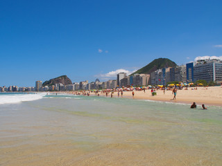 Rio de Janeiro, Brazil - 03/09/2020: sunny day on the coast of the Atlantic ocean, Copacabana beach. Copy space for text.