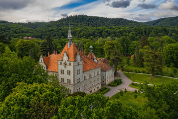 Obraz premium Aerial view on castle of Shenborn, Carpathians mountains, Ukraine. June 2020