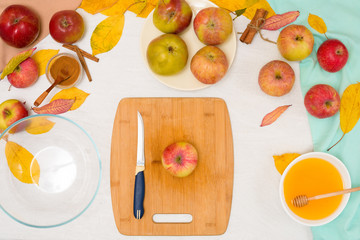 Autumn baking concept. step-by-step recipe for baking a traditional autumn Apple pie, copy the space on a light background. cut apples and mix with cinnamon and sugar