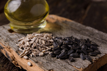 Sunflower seeds on wooden table, foreground, background image