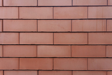 Red brick background. For the presentation of something serious and significant. Modern backgrounds.