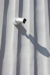 Street surveillance video camera. Security of the city and home. The people-watching. For the presentation of surveillance projects and modern equipment.
