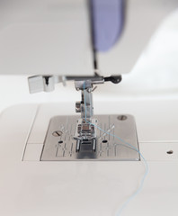 Sewing machine element on a white background. For the presentation of handwork and care of production. delicate production