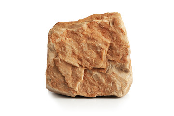 a rough piece of light stone on a white background