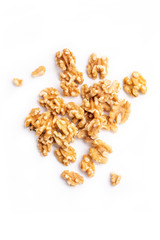 Peeled walnuts on a white background