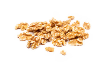 Peeled walnuts on a white background