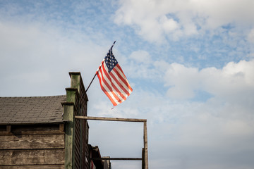 American flag on old wooden ranch