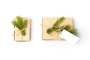 craft boxes with pine tree branches and natural rope And white label isolated on white background 