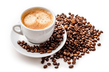 Coffee in a white cup with a saucer and coffee grains on a white background. Isolate