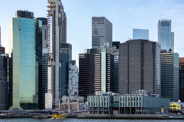 Obraz na płótnie Canvas Seaport district in downtown Manhattan with financial skyscrapers. New York city skyline on East River