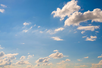 Beautiful blue summer sky with fluffy clouds