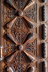 Wooden panel with ornate texture