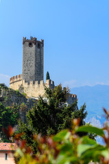 View of the walls and the tower of Scaliger Castle in Malcesine. Lake Garda northern Italy