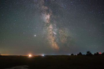 Milky Way over a field in the northern hemisphere
