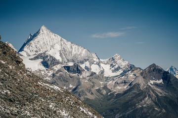 Beautiful view of a famous alpine peak Weisshorn (4506 m) in Valais, Switzerland. High and sharp,...