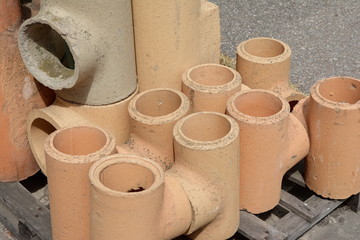 Warehouse. chamotte pipes for chimneys. modular chimney, close-up
