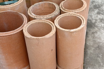 Warehouse. chamotte pipes for chimneys. modular chimney, close-up
