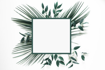 Tropical green leaf frame on white