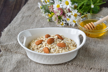 Oatmeal with almonds in a bowl.