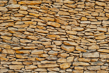 Texture of brick wall and concrete blocks. Samples of stone plates stacked evenly in a row.