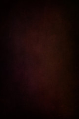 Texture for artwork and photography. Abstract dark red stained paper texture background or backdrop.