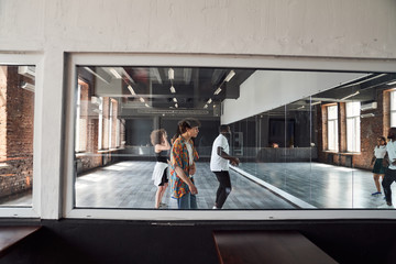 Obraz na płótnie Canvas Modern ballet members during rehearsing in studio