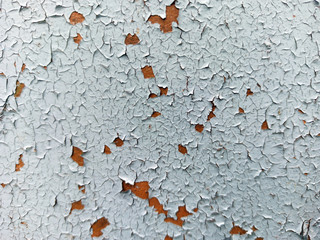 Photograph of the texture of old paint. Texture for the interior in the loft style. Cracked paint.