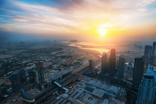 Dubai skyline at sunrise, United Arab Emirates, beautiful morning in UAE, view from above. © DedMityay