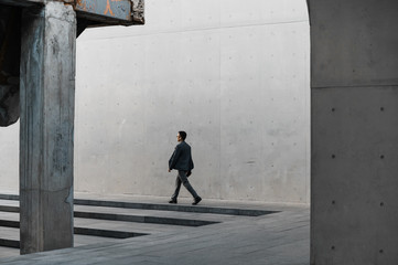 Businessman walking in office building