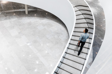 Businessman walking in office building