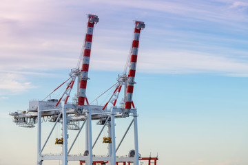 Port authority cargo cranes on wharf
