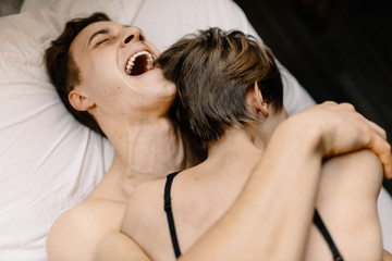 couple have fun in bed