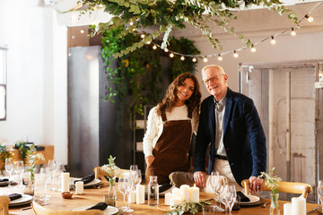 Father and daughter near banquet table