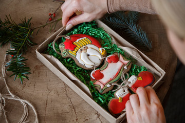 Anonymous lady creating New Year gift