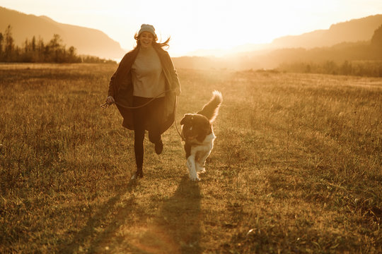 Woman playing with a dog
