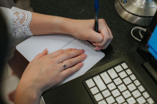 Bride Writing Wedding Vows