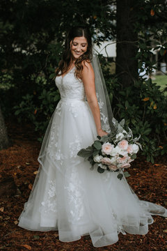 Portrait of Beautiful Bride and her Bouquet