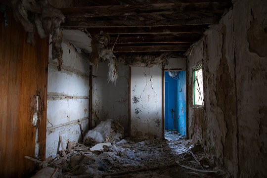 Grungy corridor of abandoned house