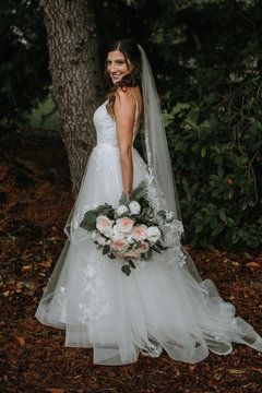 Portrait of Beautiful Bride and her Bouquet