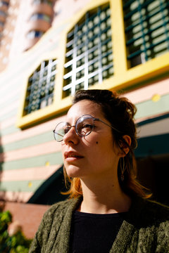 young woman with glasses.